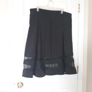 torrid A line skirt with box pleats and sheer details